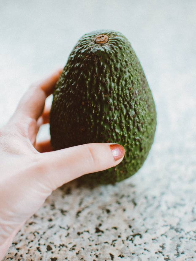 avocado in hand